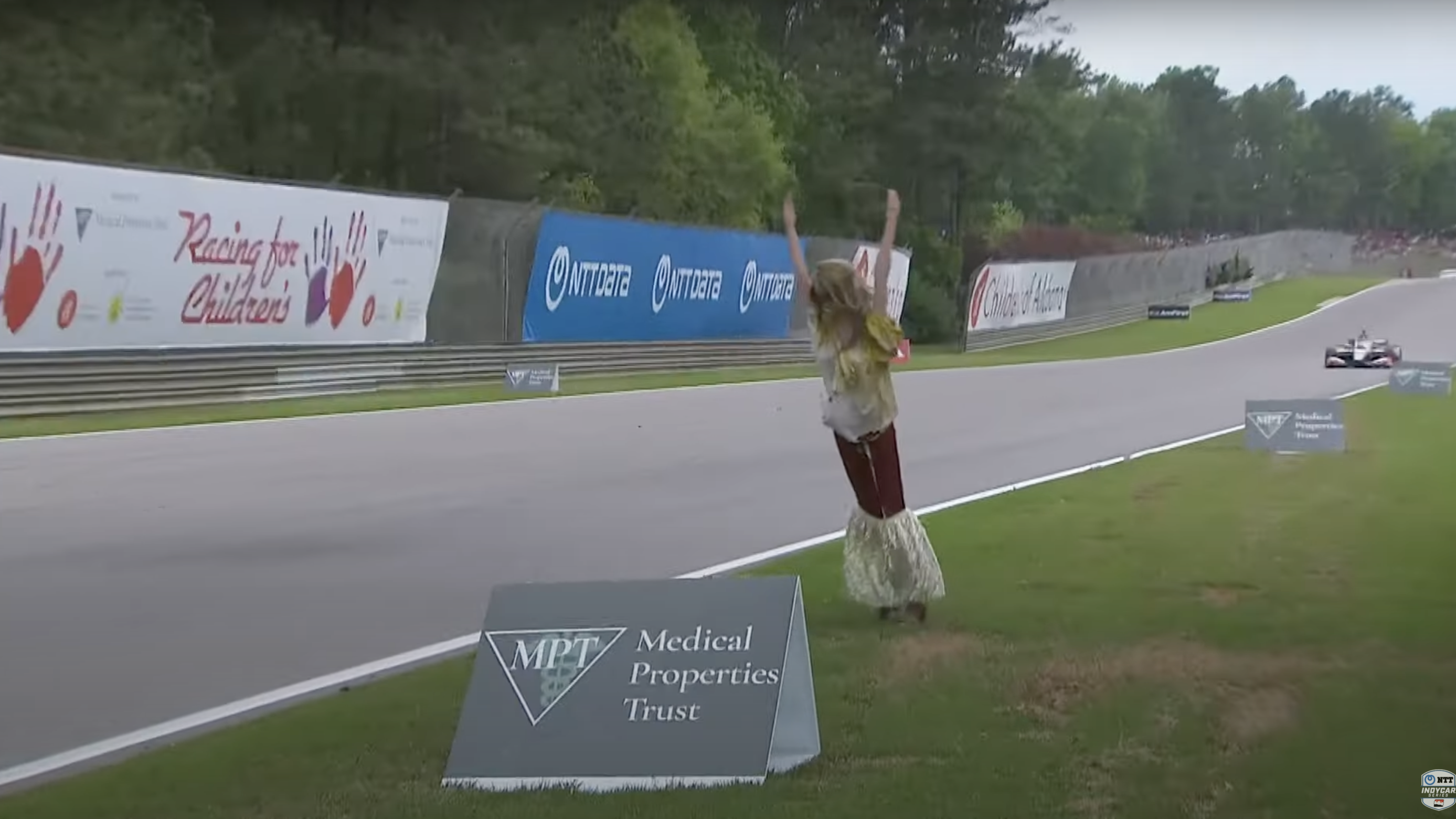 Mannequin falls onto the track during the Barber IndyCar race